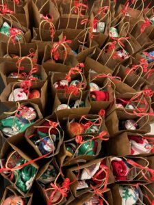 Preparing gift bags to share comfort and joy this Christmas